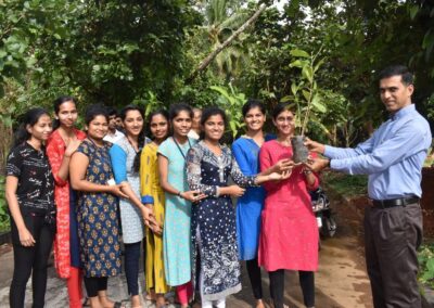 Eco Club members plant fruit-bearing saplings