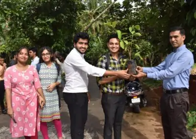 Eco Club members plant fruit-bearing saplings