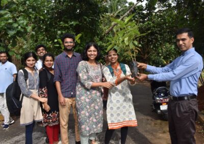 Eco Club members plant fruit-bearing saplings