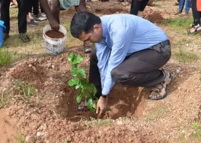 Eco Club members plant fruit-bearing saplings