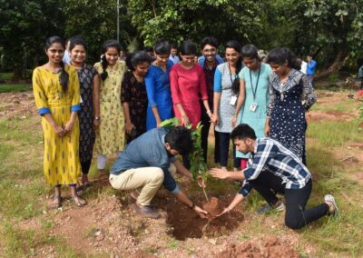 Eco Club members plant fruit-bearing saplings
