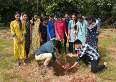 Eco Club members plant fruit-bearing saplings