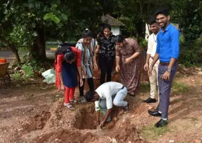 Eco Club members plant fruit-bearing saplings