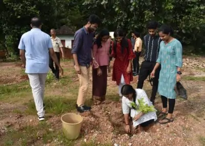Eco Club members plant fruit-bearing saplings