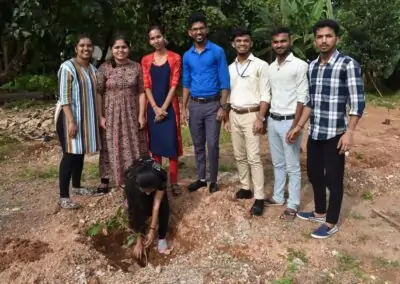 Eco Club members plant fruit-bearing saplings