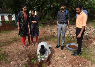 Eco Club members plant fruit-bearing saplings