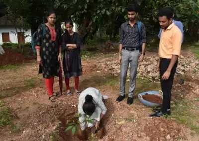 Eco Club members plant fruit-bearing saplings