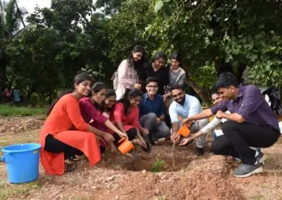 Eco Club members plant fruit-bearing saplings