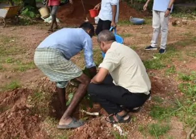 Eco Club members plant fruit-bearing saplings