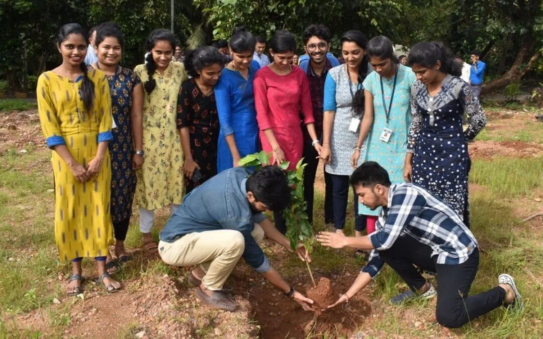 Eco Club members plant fruit-bearing saplings