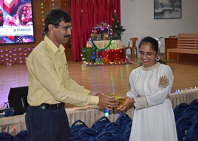 Staff of AIMIT Centre Celebrate Christmas: The Gift of Love