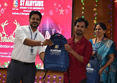 Staff of AIMIT Centre Celebrate Christmas: The Gift of Love