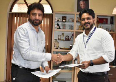 Collaborative Partnership for Advancing Education and Research: A General Agreement Between KIMS and AIMIT Centre